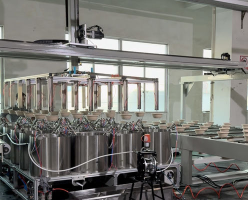 Linea di rivestimento automatico a rotazione ad alta precisione per rivestimento interno uniforme di prodotti stampati in polpa