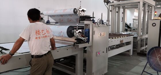 Sistema di laminazione di pellicole protettive in linea a rotolamento